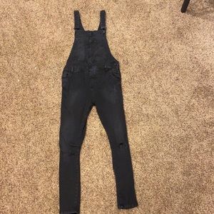 Black Jean ripped overalls from Zara.